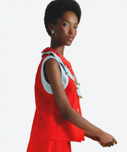 Product look side view of the Felix Matos Arilo Set featuring a red sleeveless top and matching long skirt with light blue contrast details.