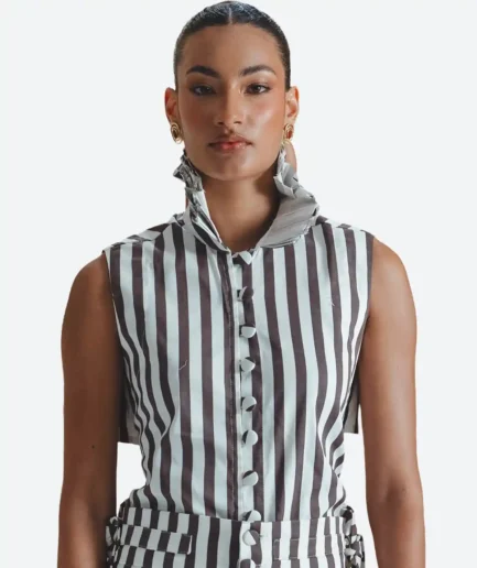 Product detail view of the Felix Matos Espiga Top featuring brown and white stripes, a sleeveless silhouette, high collar and front button details.