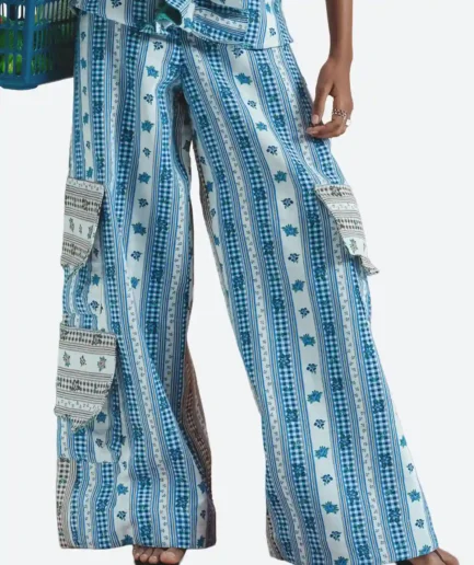 Product detail front view of the Felix Matos Rocío Pants featuring a blue and white printed wide-leg silhouette with cargo-style pockets and contrast panels.