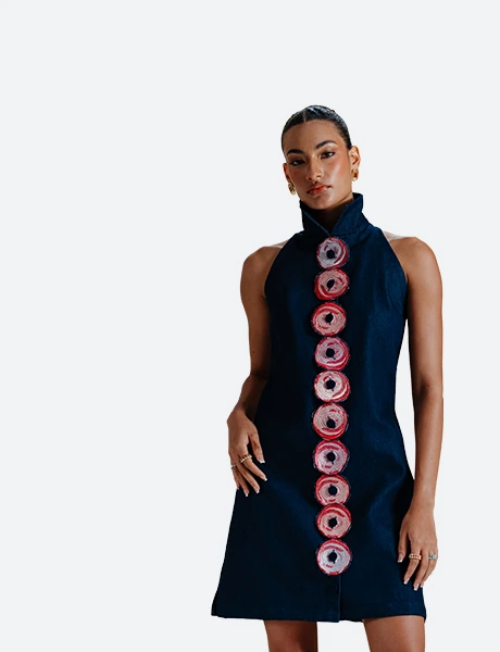 Dresses category product look view for Felix Matos featuring a deep blue sleeveless mini dress with red circular appliqué details.